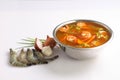 Spicy Thai soup white background in a steeliness steel bowl Royalty Free Stock Photo