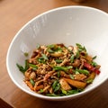 spicy Thai spaghetti with onions and sesame seeds. Food concept. Eastern cuisine. Square format or 1x1 for posting on