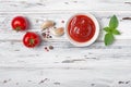 Spicy tomato ketchup sauce with Cherry tomatoes, garlic and basil Royalty Free Stock Photo