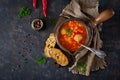 Spicy tomato soup with meatballs, pasta and vegetables. Healthy dinner. Royalty Free Stock Photo