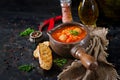 Spicy tomato soup with meatballs, pasta and vegetables. Royalty Free Stock Photo