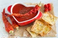 Spicy tomato soup with red pepper and cheese crisps Royalty Free Stock Photo