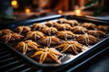 spider-shaped cookies on a baking sheet straight from the oven Royalty Free Stock Photo