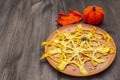 Spider web pancakes with sugar syrup and powder for Halloween breakfast. With crochet orange pumpkin and leaf Royalty Free Stock Photo