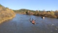 The spider wove a net over the river. Royalty Free Stock Photo