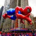 Spiderman balloon floats in the air during the annual Macy`s Thanksgiving Day parade along Avenue of Americas