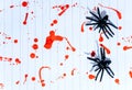 Spiders on a white background covered with blood, Halloween.