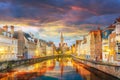 Spiegelrei canal and Jan Van Eyck Square at sunset Royalty Free Stock Photo