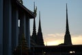 Spiers of a Buddhist temple at dusk. Religious architectural art of southeast asia