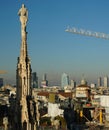 Spiers of the Duomo Cathedral look at modern Milan