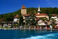 View of the landscape with Spiez Castle and lake Thun embankment, near Interlaken, Switzerland