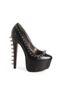 Spike on black high heel shoes Royalty Free Stock Photo
