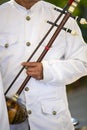 Musician playing a Tro at a Cambodian Wedding Ceremony