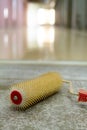 spiked roller is a tool commonly used to remove air bubbles from freshly poured epoxy flooring