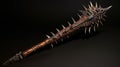 Spiked Weapon A Dark And Texturally Suggestive Long Wooden Handle