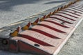 Spikes barrier are frequently used to enforce a directional flow in a single traffic lane barrier