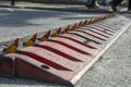 Spikes barrier are frequently used to enforce a directional flow in a single traffic lane barrier