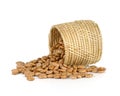 spill the beans - pinto beans spilled from basket isolated on white background