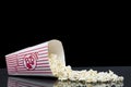 Spilled box of popcorn Royalty Free Stock Photo