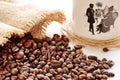 Spilled coffee beans from canvas sack and porcellaneous mug Royalty Free Stock Photo