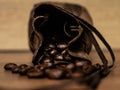 spilled coffee beans from a leather bag Royalty Free Stock Photo