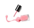 Spilled color nail polish with bottle and brush on white background Royalty Free Stock Photo