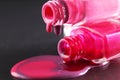 Spilled nail polish close-up on a black background with a place for text copyspace Royalty Free Stock Photo