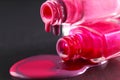 spilled nail polish close-up on a black background with a place for text copyspace Royalty Free Stock Photo