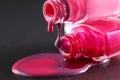 spilled nail polish close-up on a black background with a place for text copyspace Royalty Free Stock Photo