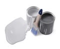 Spilled paint, brush and cans on white background Royalty Free Stock Photo