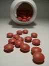 Spilled pills and bottle Royalty Free Stock Photo