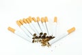 Spilled tobacco and cigarettes Royalty Free Stock Photo