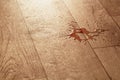 Spilled water drops on linoleum with wood texture Royalty Free Stock Photo