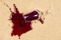 Spilled wine on carpet Royalty Free Stock Photo