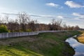 Spillway and flood barrier views of metal dike to protect from flooding by Opryland along the Shelby Bottoms Greenway and Natural