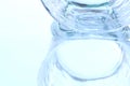 Spilt water and glass cup background