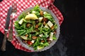 Spinach and Avocado Salad with Arugula, Pear, and Almonds