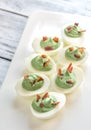 Spinach and bacon deviled eggs Royalty Free Stock Photo