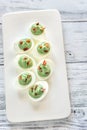 Spinach and bacon deviled eggs Royalty Free Stock Photo