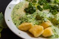 Spinach broccoli sauce with potato gnocchi horizontal view