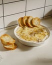 Spinach cheese dip with crispy toasts Royalty Free Stock Photo