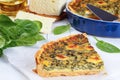 Spinach, cheese Quiche Florentine cut in slices Royalty Free Stock Photo