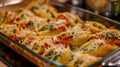 Homemade Spinach and Cheese Stuffed Shells in a Homely Kitchen Royalty Free Stock Photo