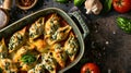Homemade Spinach and Cheese Stuffed Shells in a Homely Kitchen Royalty Free Stock Photo