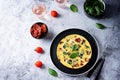 Spinach Dried tomatoes Frittata in a plate