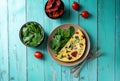 Spinach Dried tomatoes Frittata in a plate