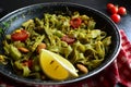 Spinach Fettuccine with Asparagus, Tomatoes, Zucchini and Almonds Royalty Free Stock Photo