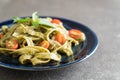 spinach fettuccine with tomatoes Royalty Free Stock Photo