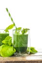 Spinach leaves smoothie in glass. Vegetarian nutrition