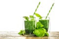 Spinach leaves smoothie in transparent glass. Healthy green drink